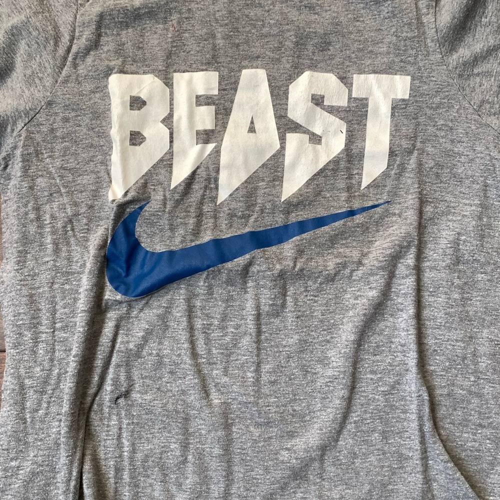 Nike blue swoosh grey shirt
